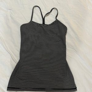 Lululemon black and white strip power Y tank top. Size 6, good condition.